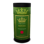 Green and black cylindrical container of Snobby Coffee Matcha tea on a white background