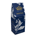Snobby Coffee Heritage coffee package with blue design and gold accents on a white background